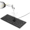 e5b1af51b01349eea9e62416245e6323.webp K1000 Ultra-Thin Slim Mini Keyboard – 78 Keys, Silent & Waterproof for Windows PCs